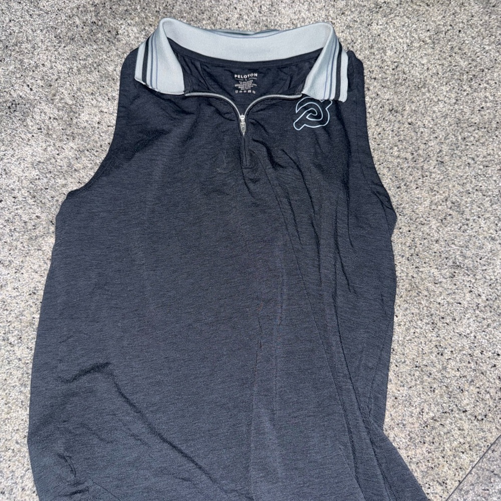 Peloton Sleeveless Zip Polo in Black and Light Blue